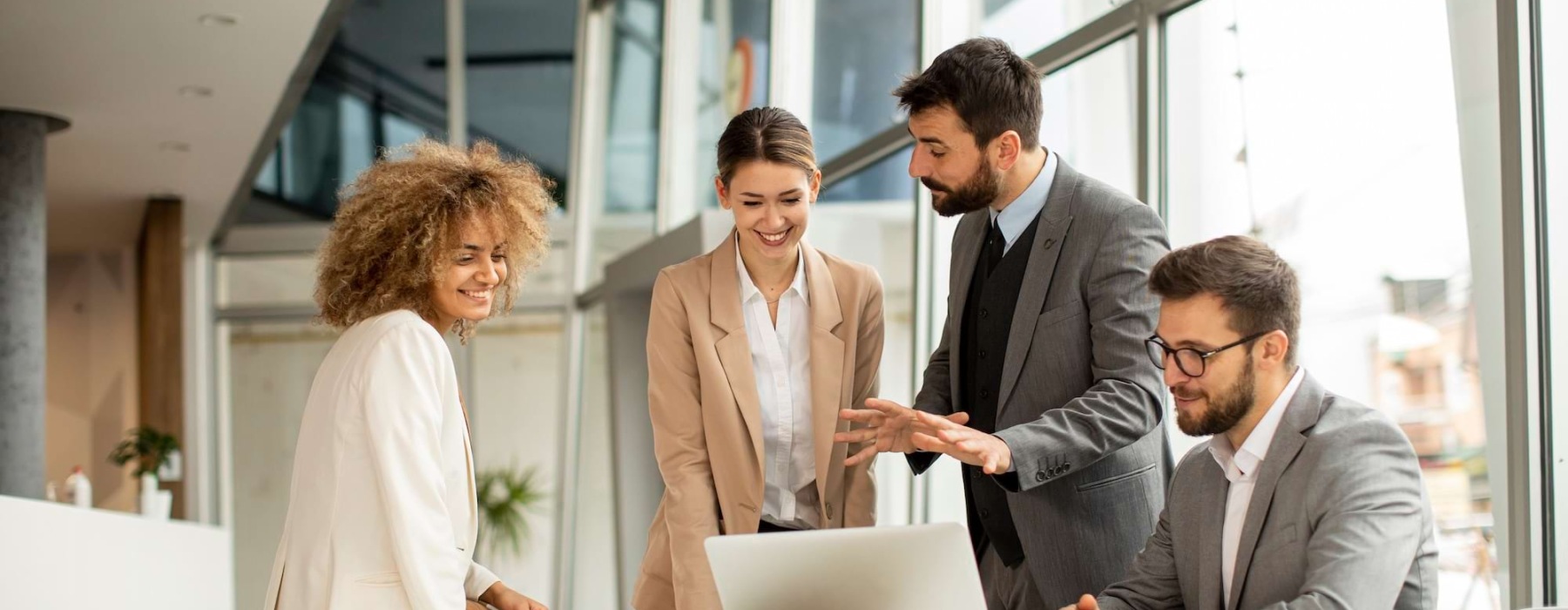 Stock photo 4 people working in office