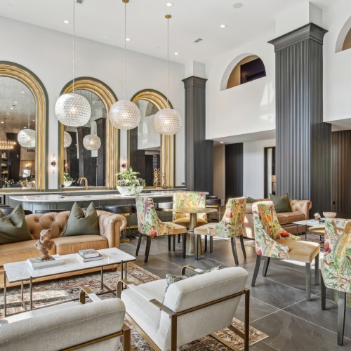 A perfect fit for the whole family Resident lounge with bar at The Lacy's pet-friendly apartments in Kennesaw, GA